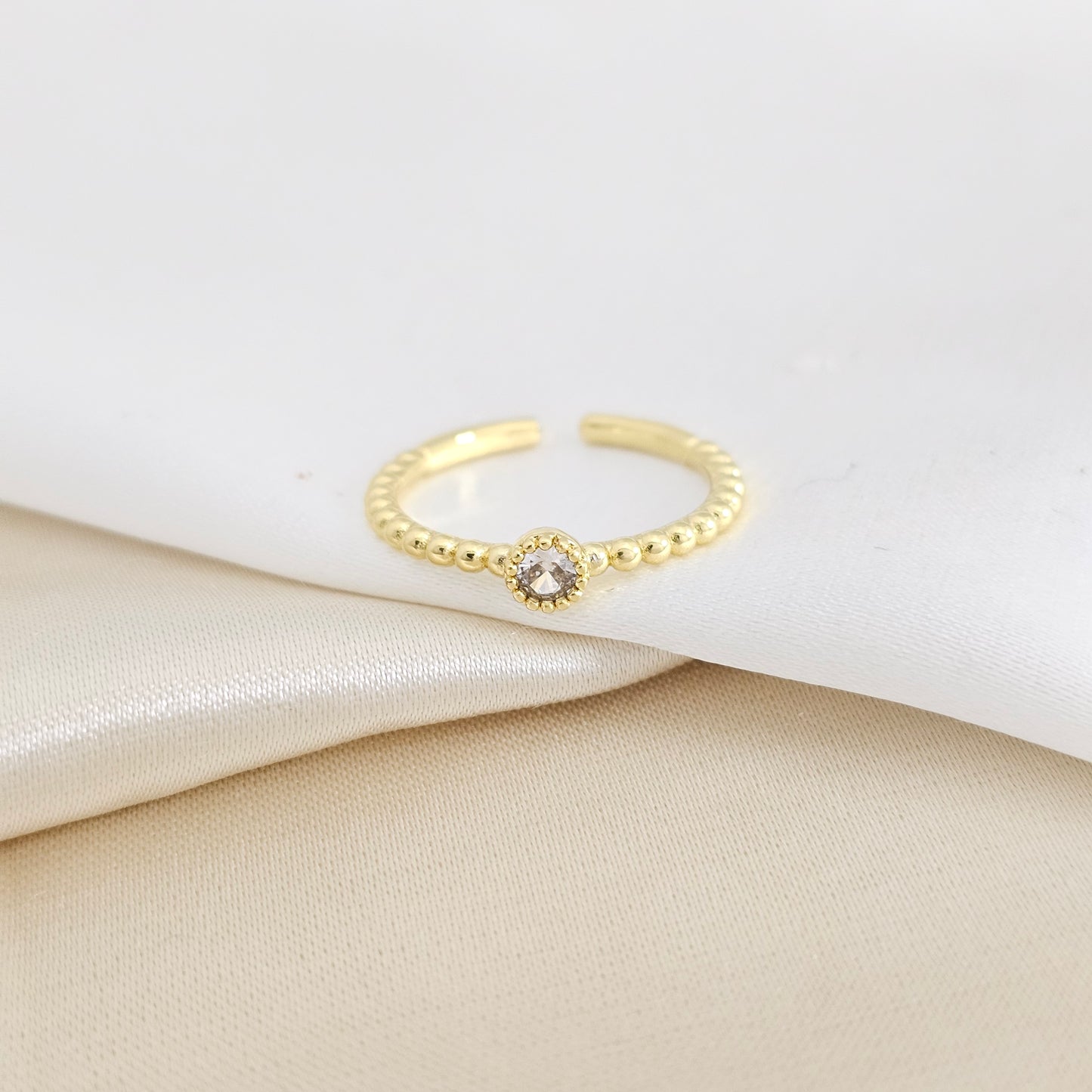 ANILLO BALINES DORADO CON CIRCON REDONDO CRISTAL RF K7929