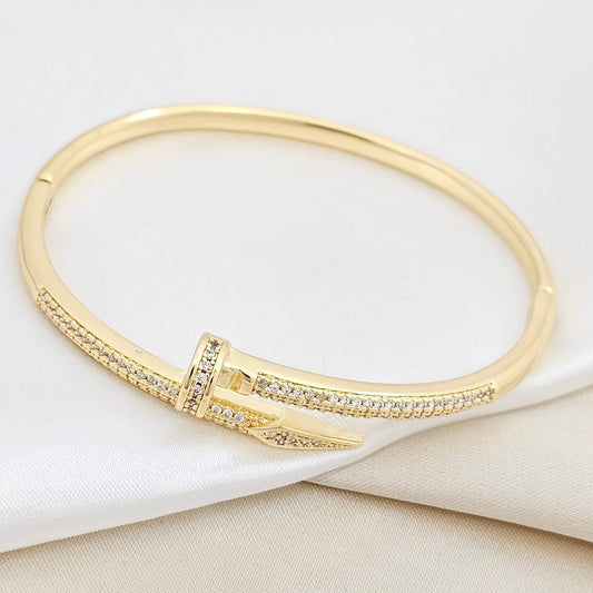 BRAZALETE CLAVO GRANDE CON CIRCONES DORADO RF K6352