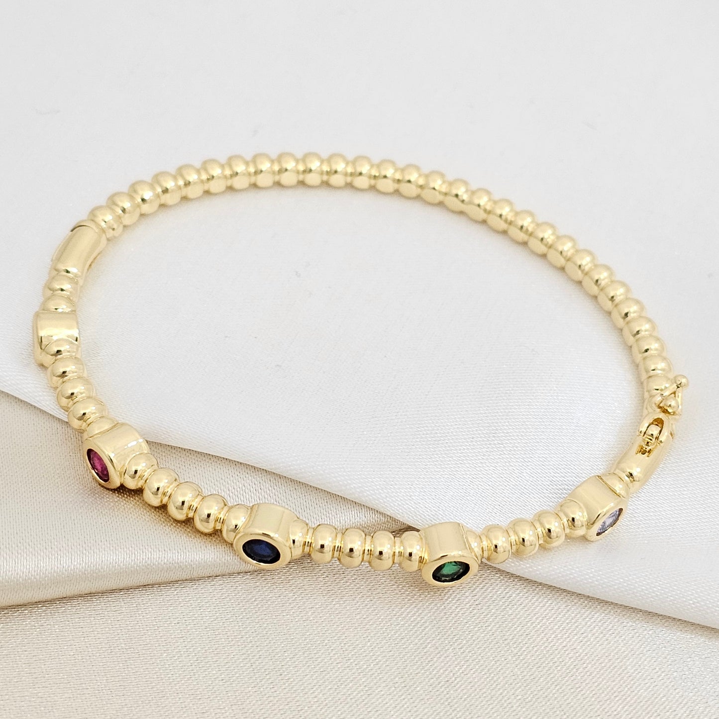 BRAZALETE CINCO CIRCULOS DORADO CIRCONES DE COLORES RF K7167