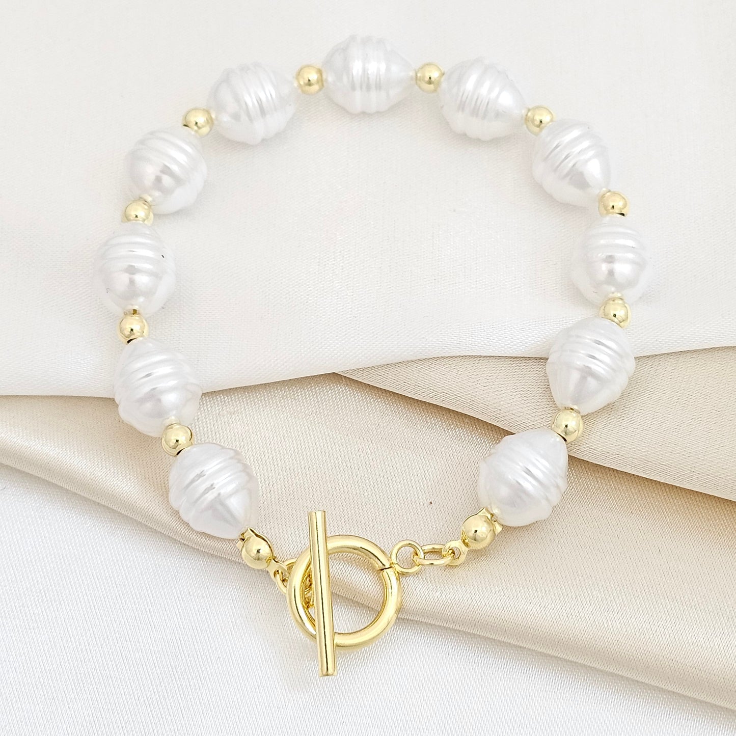 PULSERA PERLAS TRES LINEAS CON BALINES DORADO RF K5735