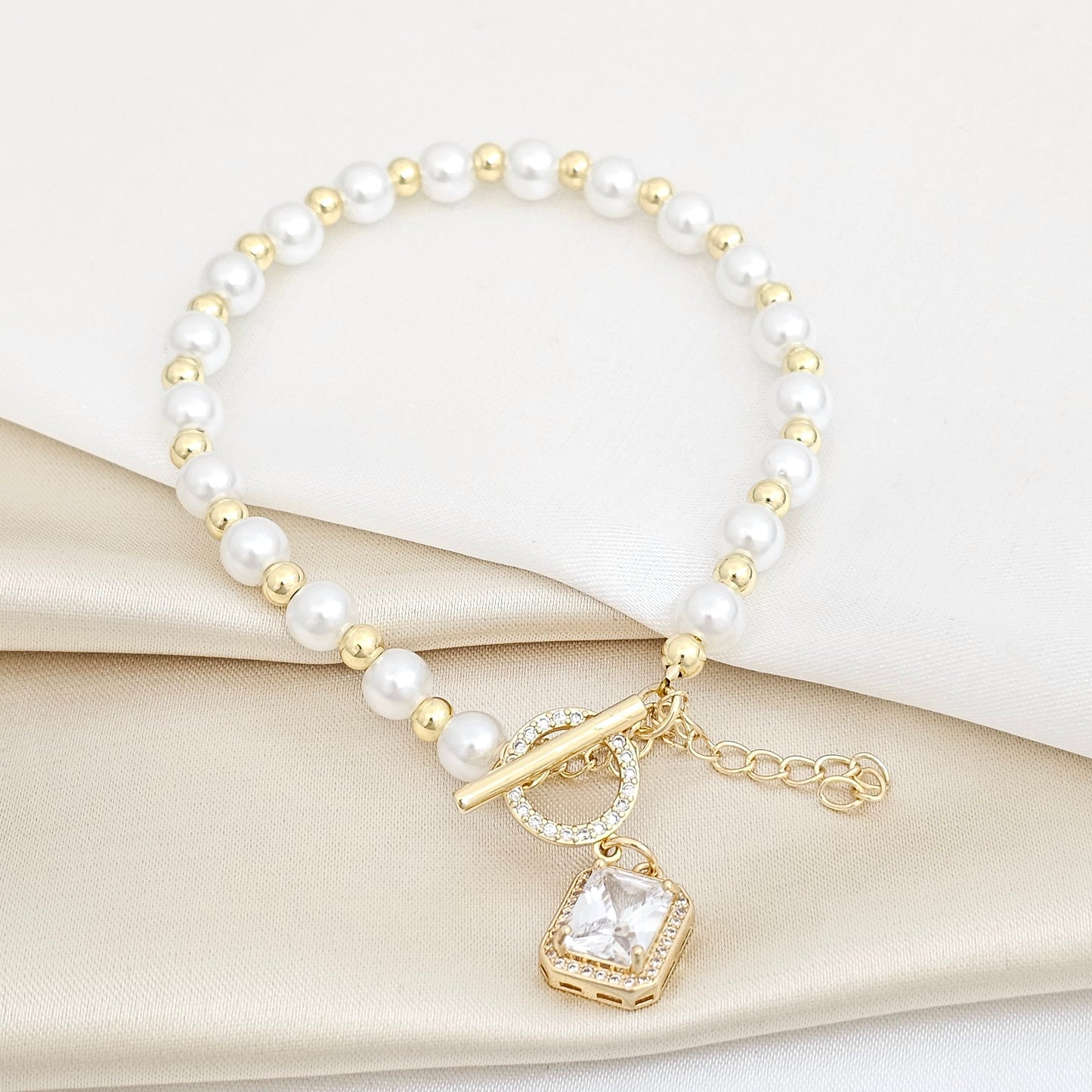 PULSERA PERLAS Y BALINES CON DIJE CIRCON CUADRADO RF K5746