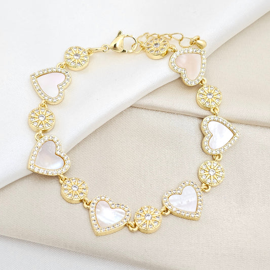 PULSERA CORAZONES CON NACAR Y CIRCONES DORADO RF K6527