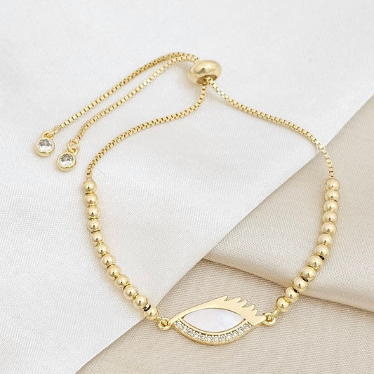 PULSERA CORREDIZA BALINES CON DIJE OJO NACAR Y CIRCONES RF K6734