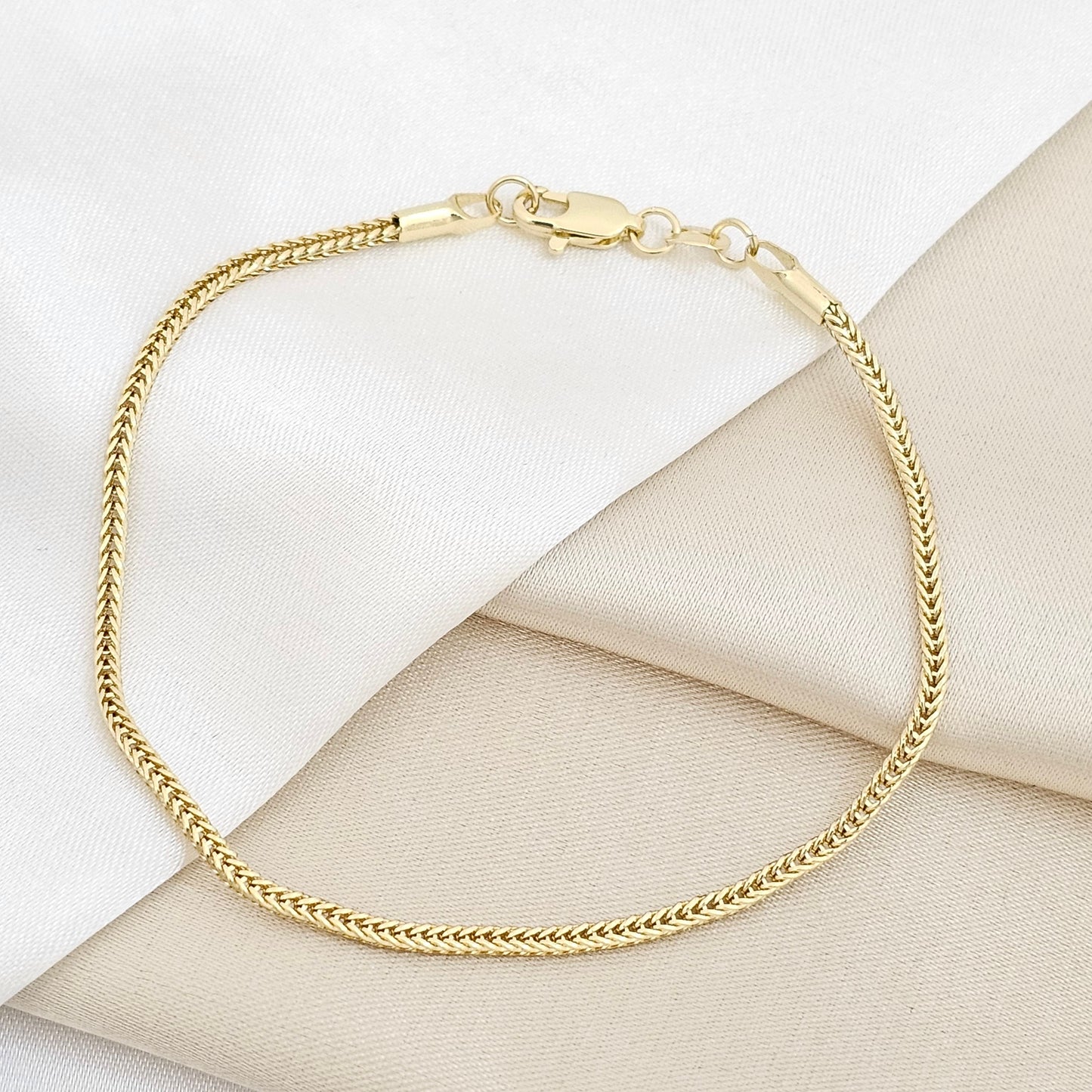 PULSERA ENLAZADA CUADRADA DORADO RF K6743