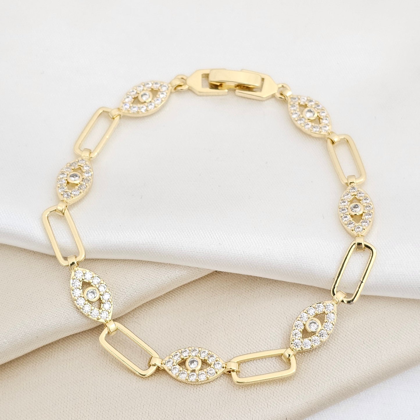 PULSERA AROS Y OJOS CON CIRCONES BROCHE DORADO RF K6989
