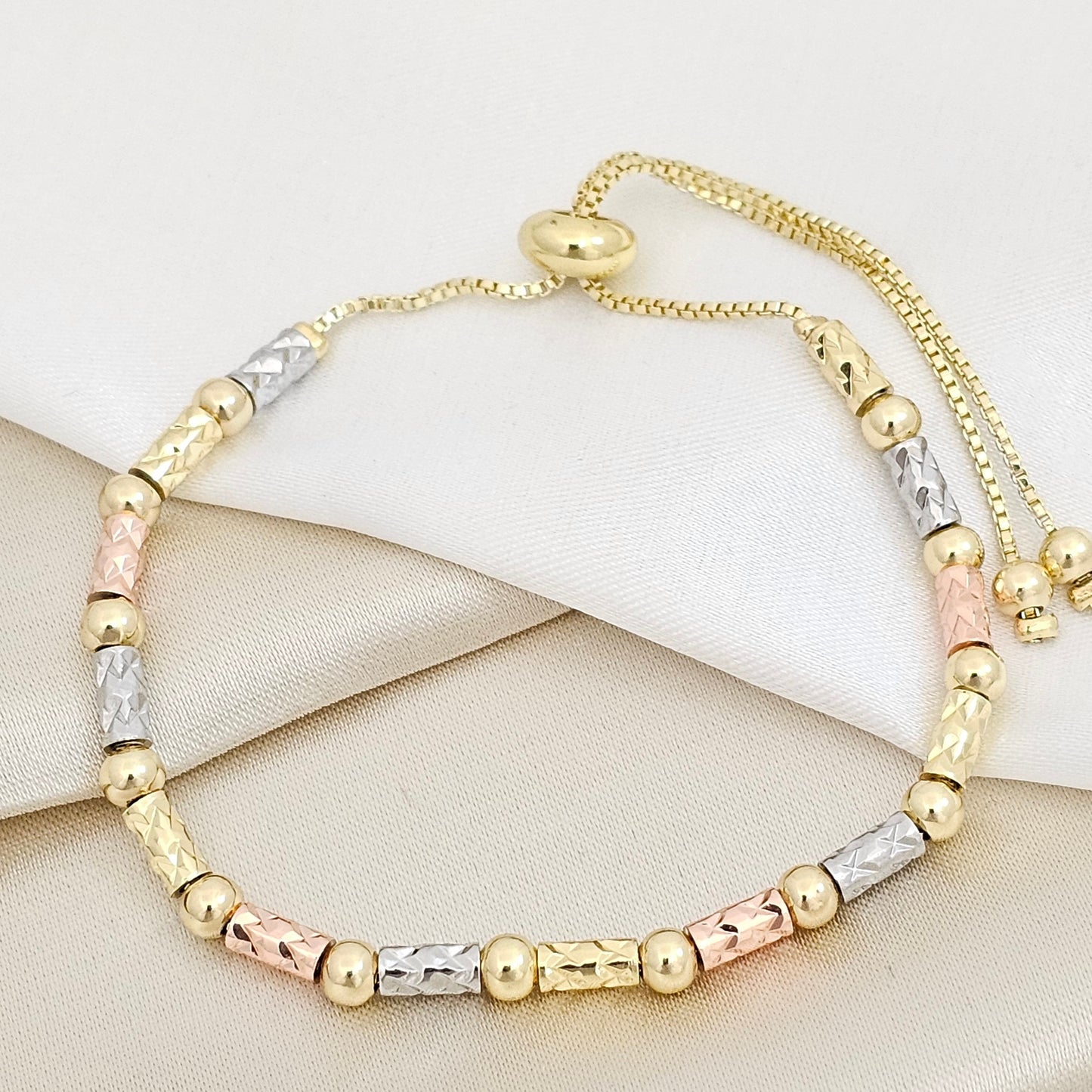 PULSERA CANUTILLO Y BALINES N4 TRES TONOS CORREDIZA RF K7465