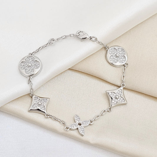 PULSERA LV TREBOL CON CIRCONES PLATEADO RF K7653