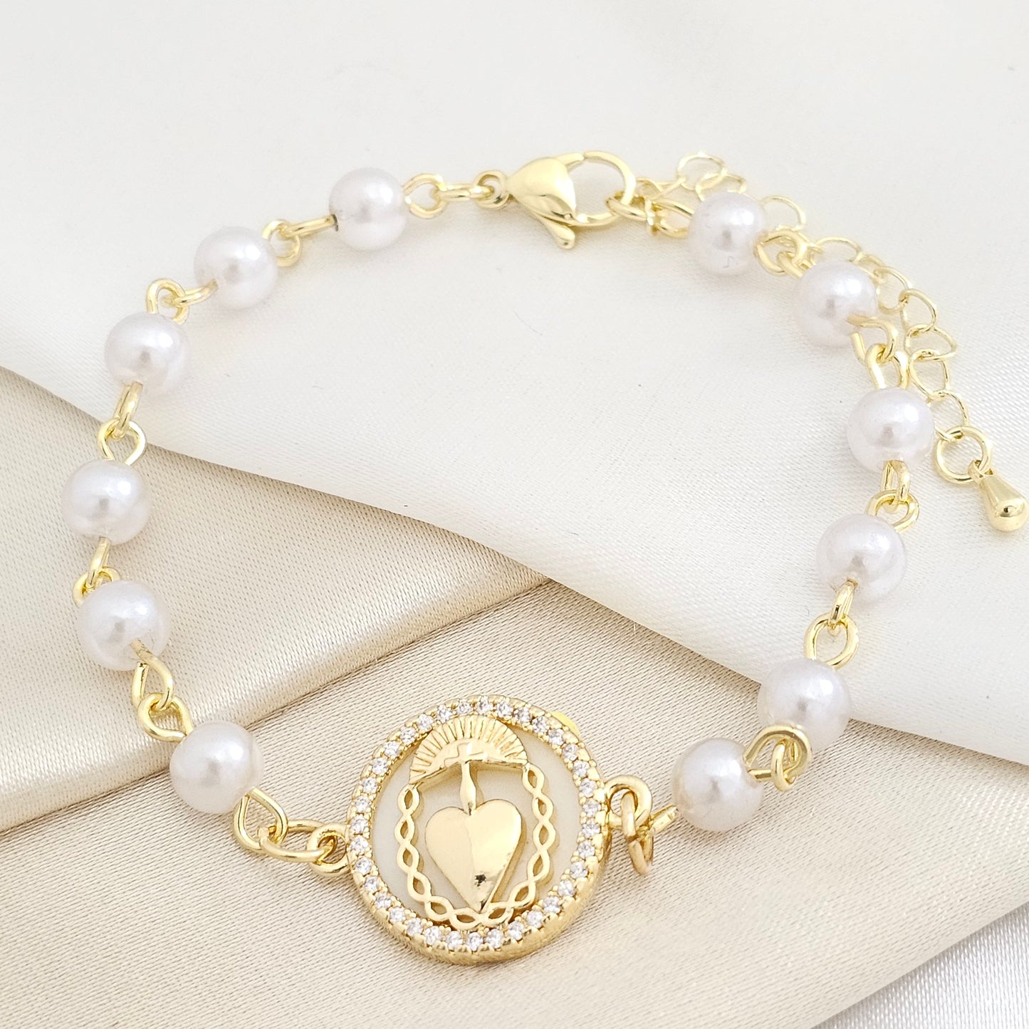 PULSERA PERLAS N6 DIJE NACAR CON CORAZON DORADO RF K7770