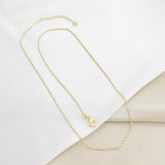 CADENA CANUTILLO MINI RAYADO CON EXTENSOR DORADO RF K5911
