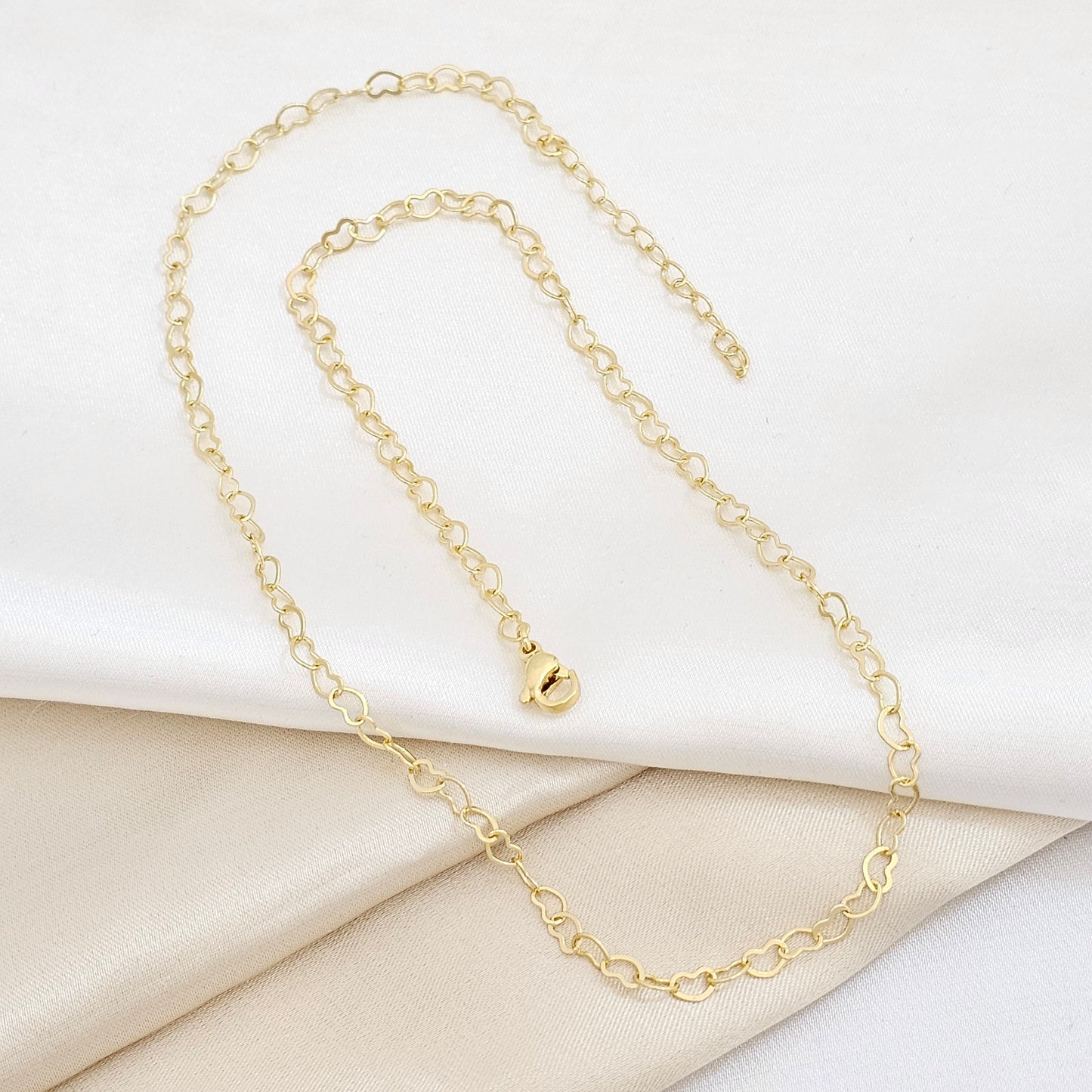 CADENA CORAZONES DELGADA CON EXTENSOR DORADA RF K6132