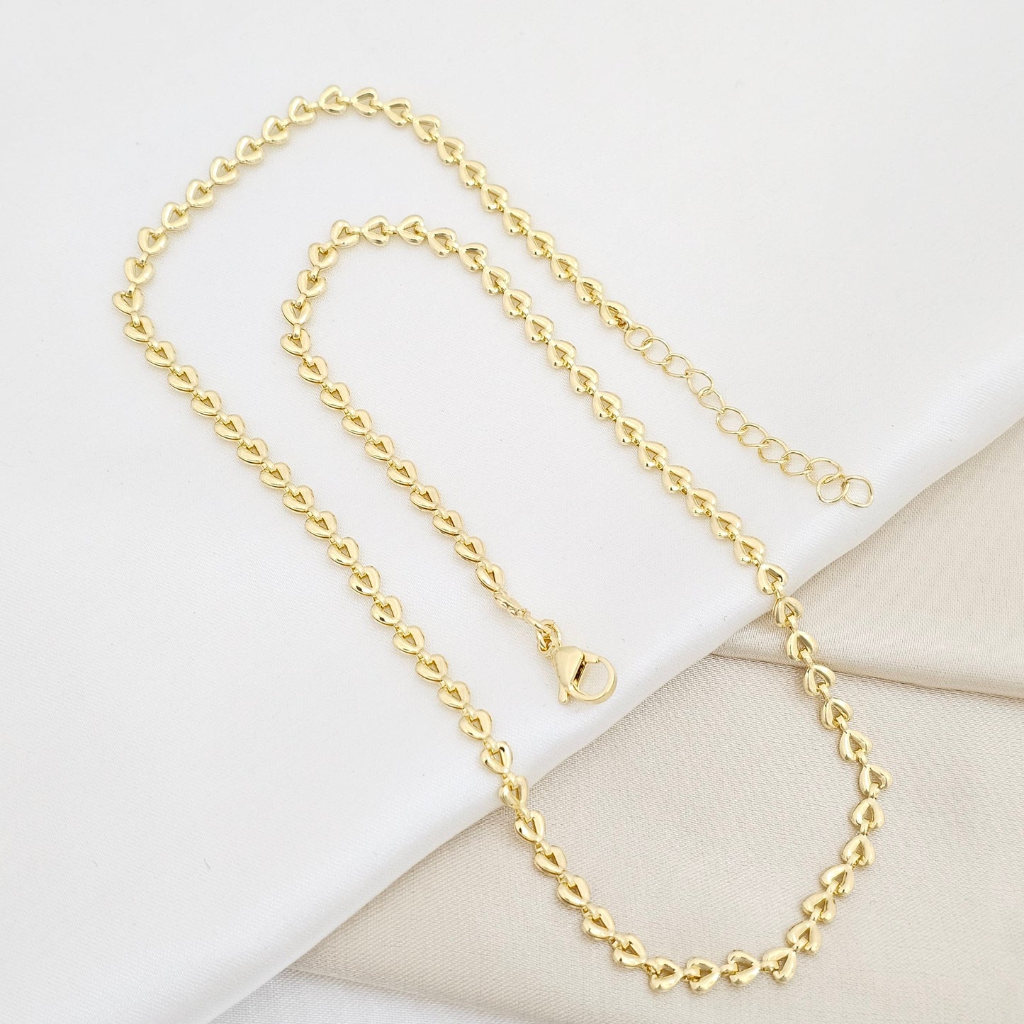 CADENA CORAZONES PEQUEÑOS ENLAZADOS DORADO RF K6550