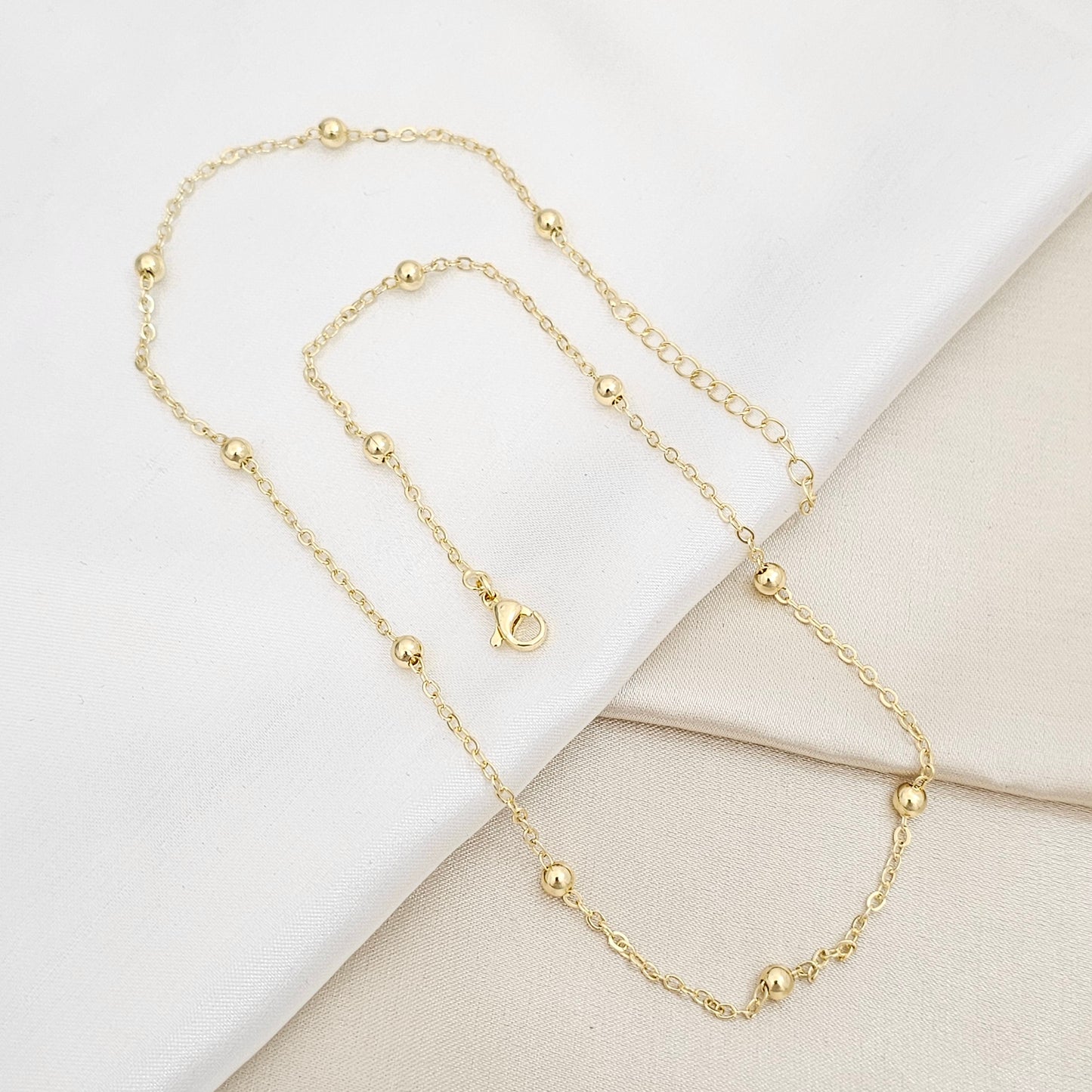 CADENA AROS CON BALINES N5 Y EXTENSOR DORADO RF K6665