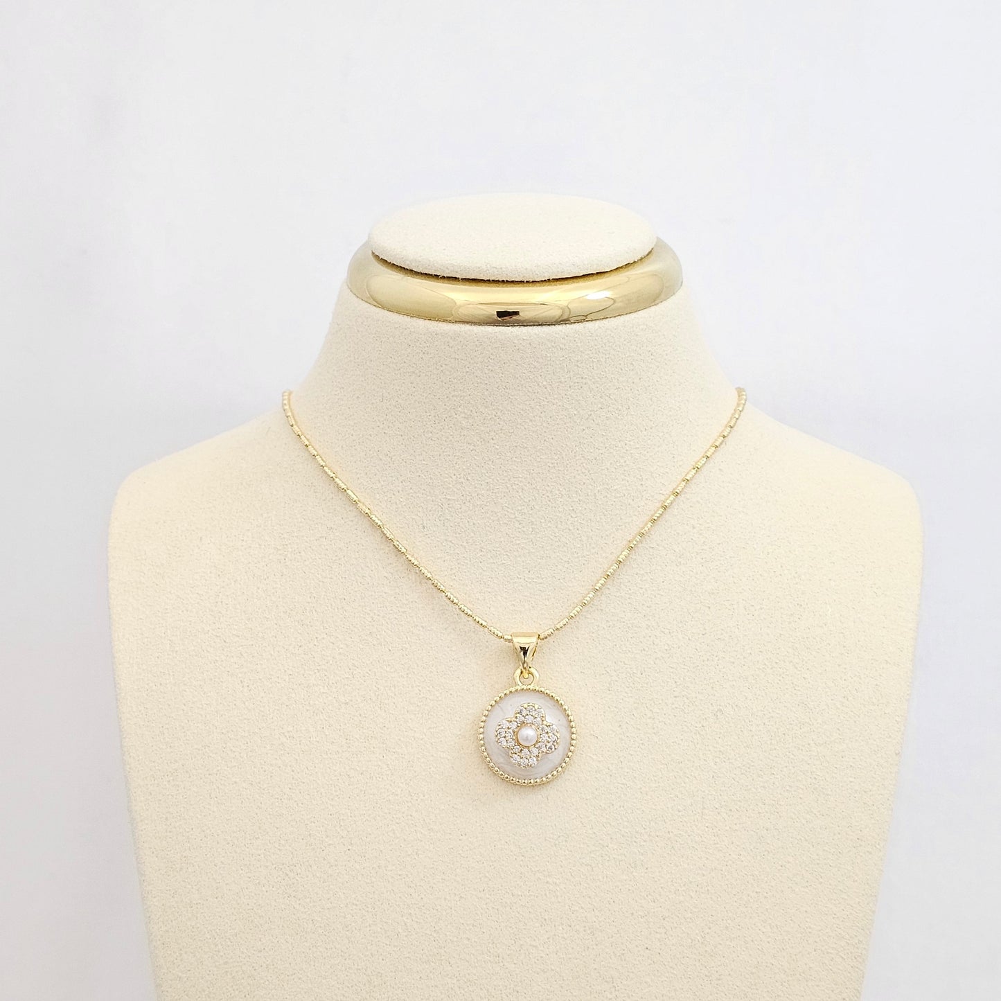 CADENA CANUTILLO RAYADO DIJE FLOR CON NACAR DORADO RF K6970