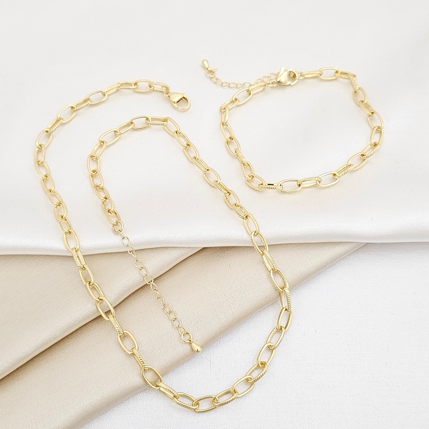 SET CADENA Y PULSERA AROS RAYADOS CON EXTENSOR DORADO RF K6974