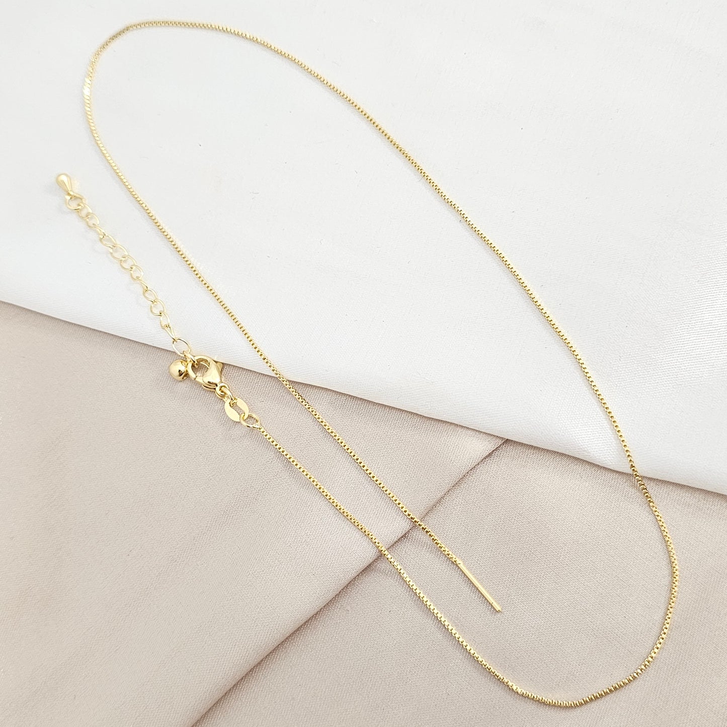 CADENA VENECIANA 1MM PUNTA AGUJA Y EXTENSOR DORADO RF K8095