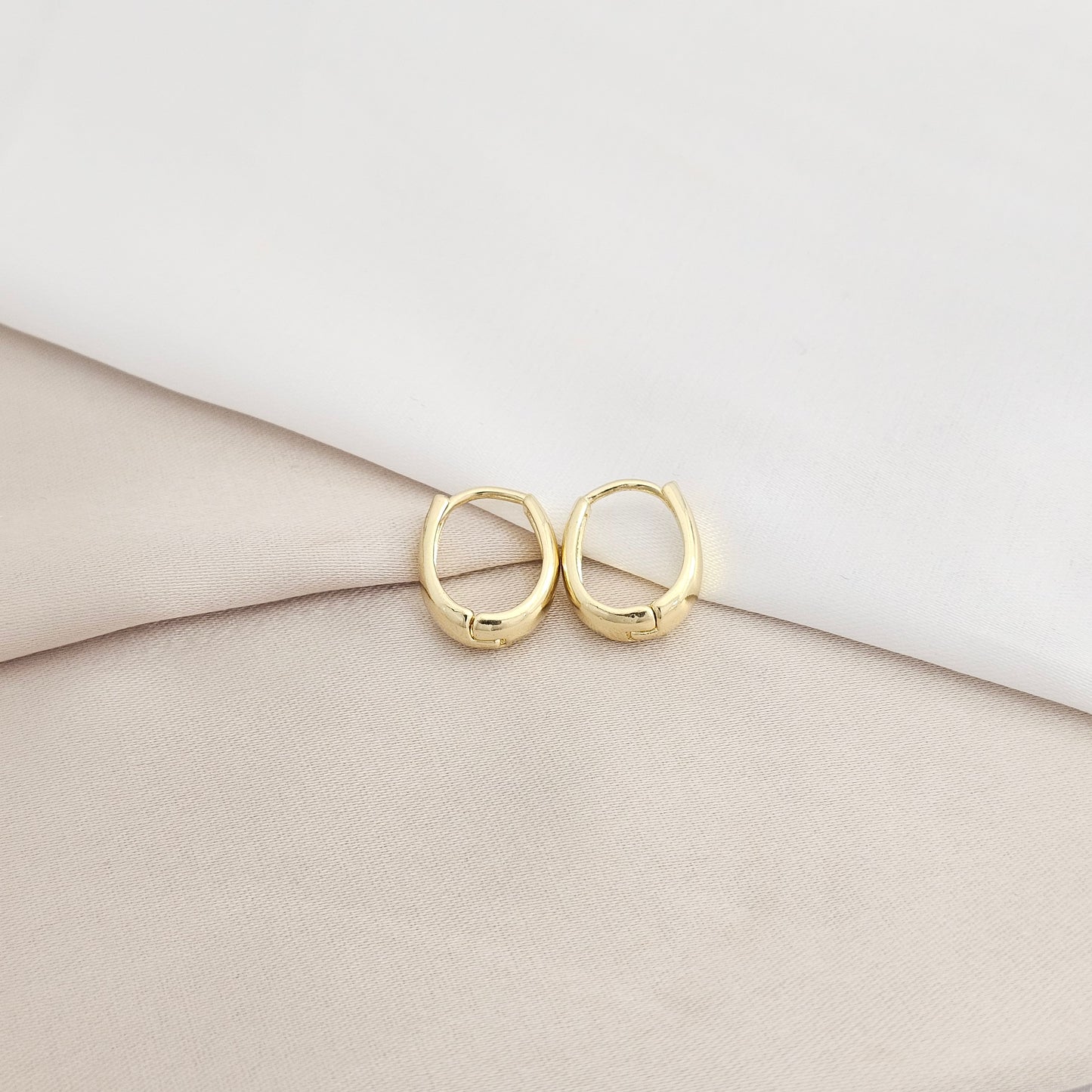 CANDONGA LISA 12MM OVALADA DORADO RF K7977