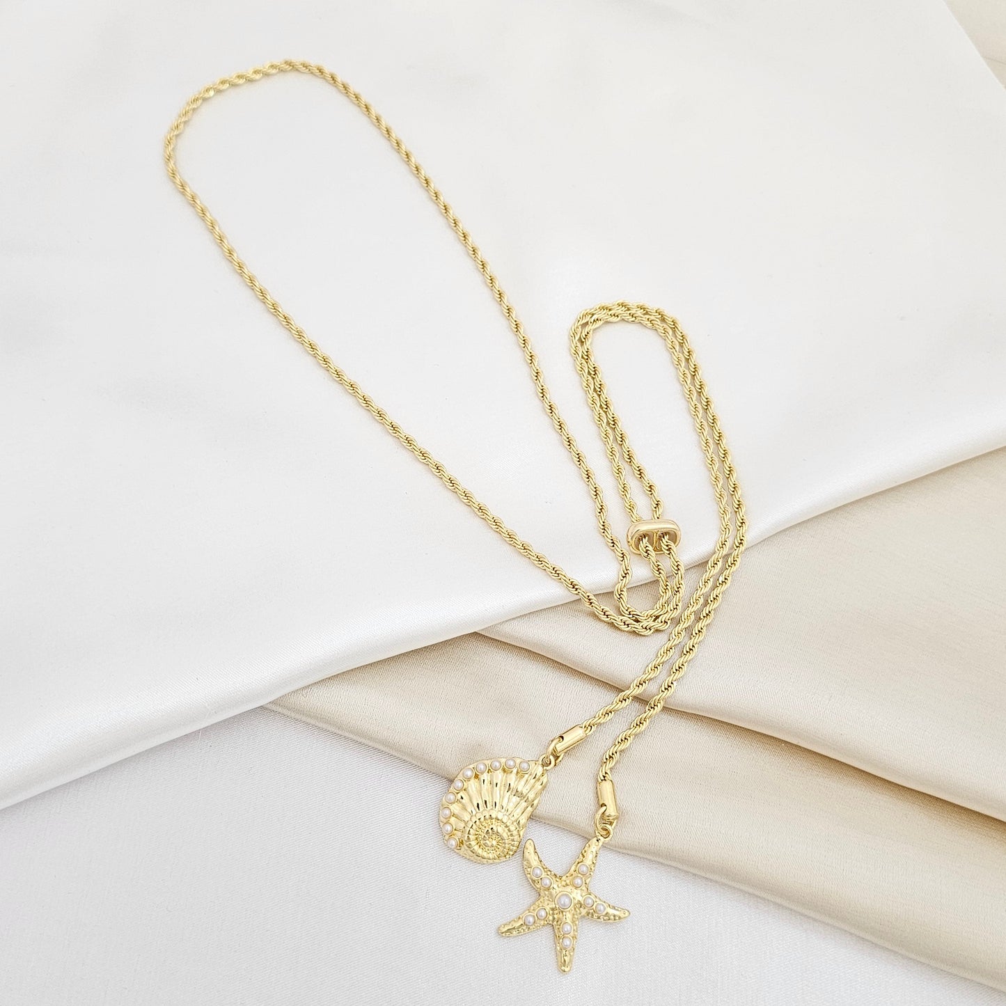 COLLAR LAZO CORREDIZO DIJES CARACOL Y ESTRELLA DORADO RF K6924