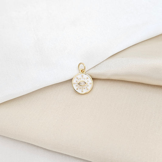 DIJE CIRCULO BLANCO CON OJO DORADO RF K5906