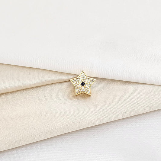 CHARM ESTRELLA DORADO CON CIRCON AZUL RF K5984