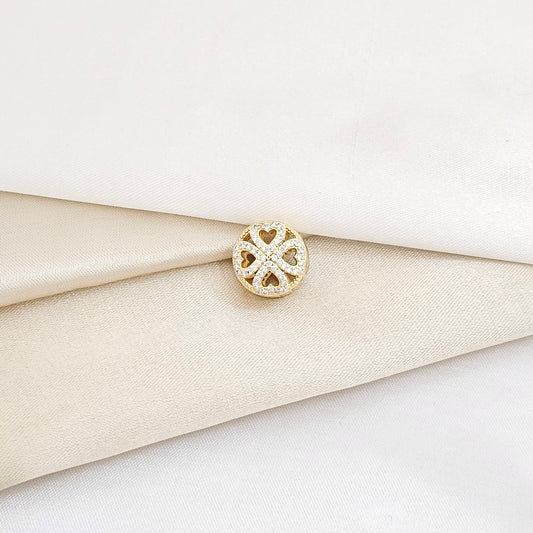 CHARM REDONDO CORAZONES EN X DORADO RF K5988
