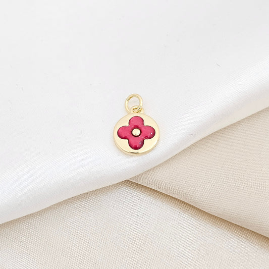 DIJE CIRCULO DORADO CON FLOR ROJA RF K6254