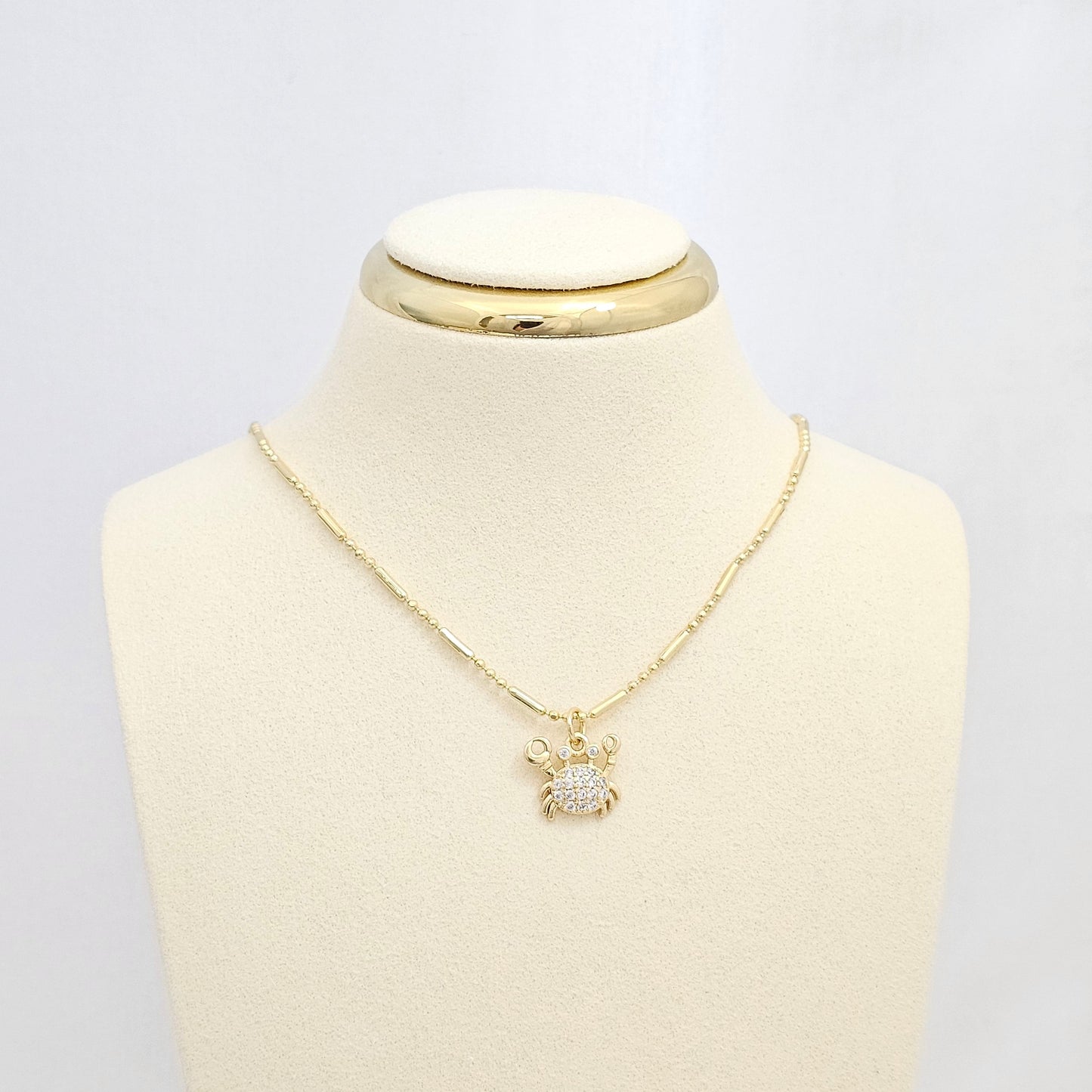DIJE MINI CANGREJO DORADO CON CIRCONES RF K6658