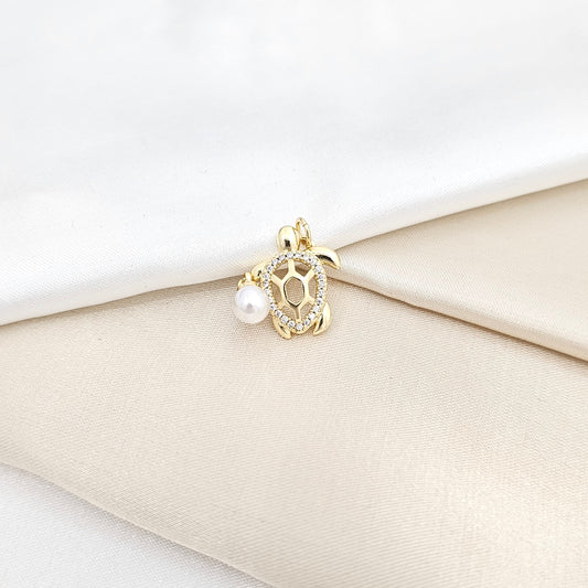 DIJE TORTUGA DORADO CON PERLA COLGANTE RF K6686
