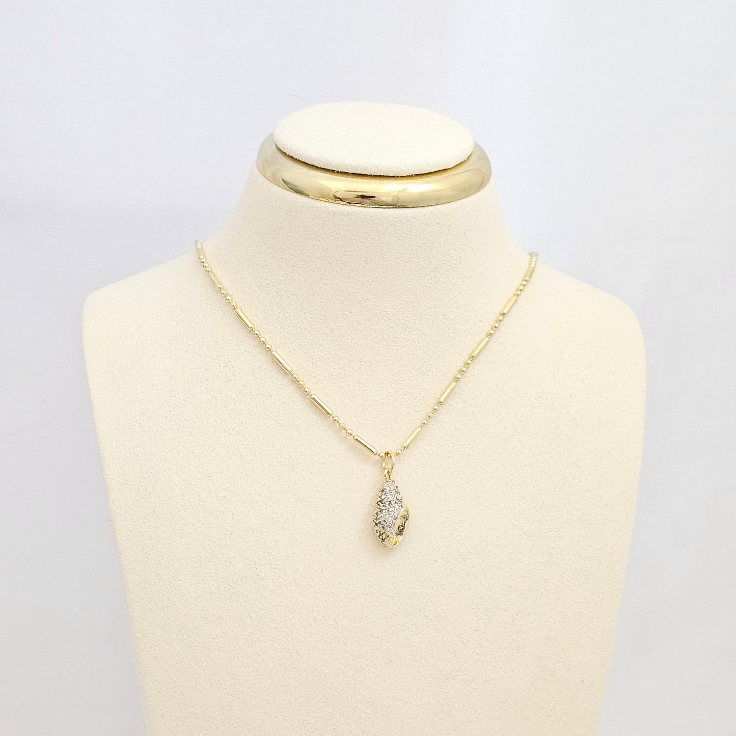DIJE MINI CARACOLA CIRCONES DORADO RF K6692