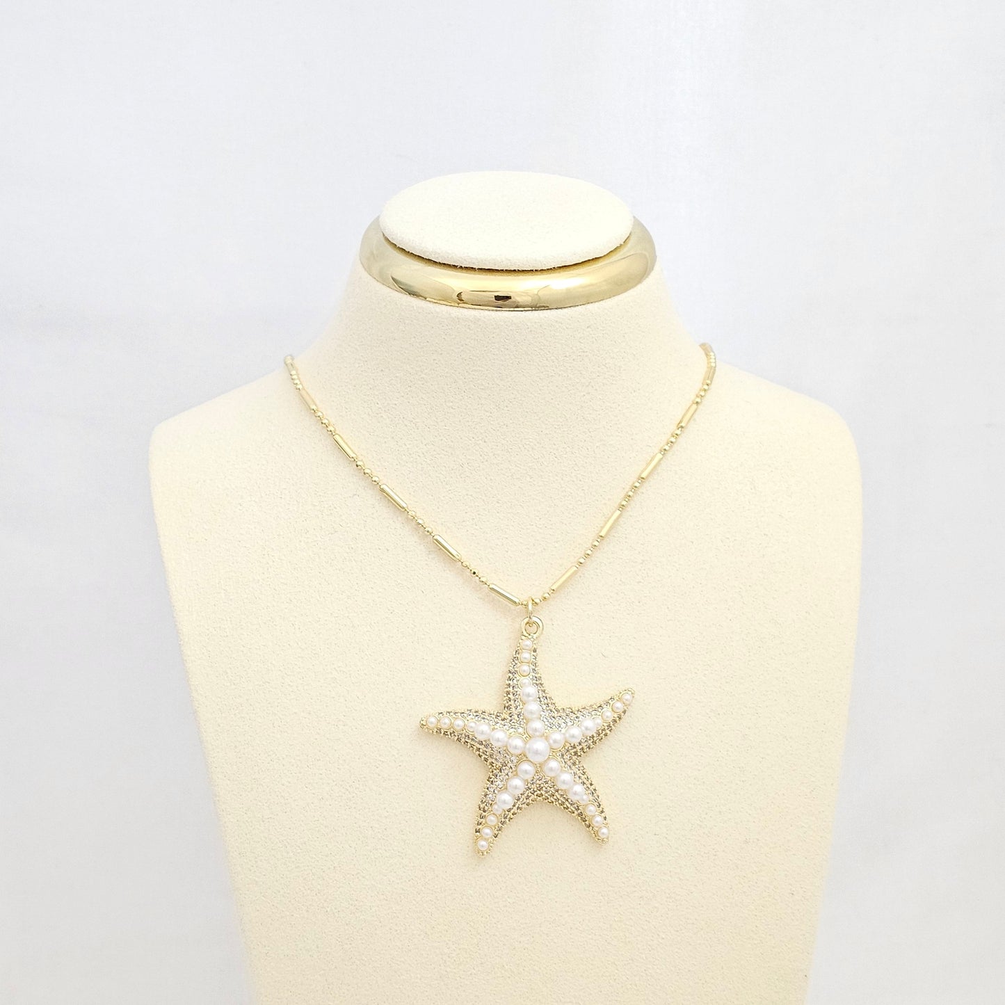 DIJE ESTRELLA DE MAR GRANDE DORADO CON PERLAS RF K6702