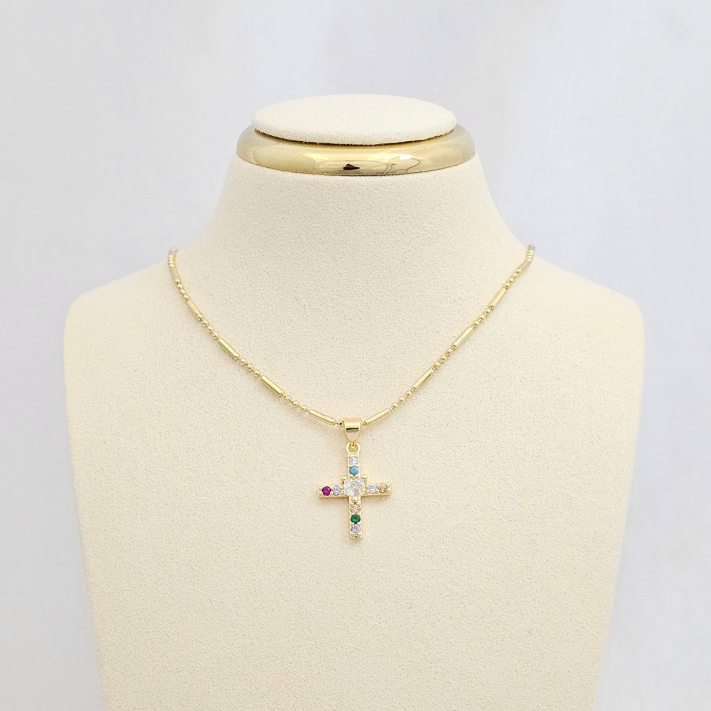 DIJE CRUZ DORADO Y CORAZON CIRCONES DE COLORES RF K6789