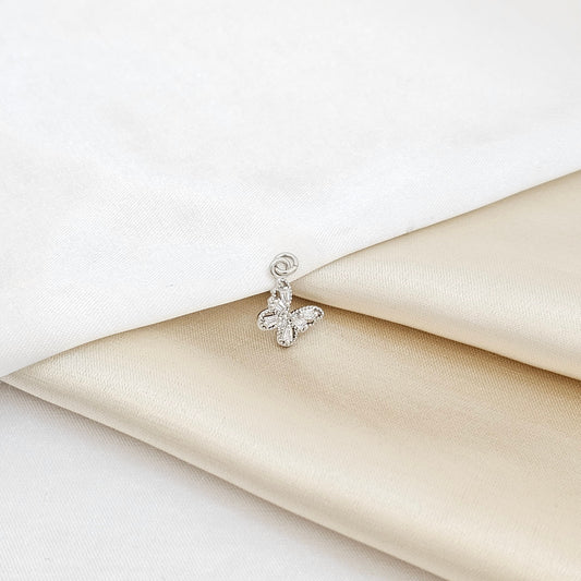 DIJE MINI MARIPOSA SEIS CIRCONES PLATEADO RF K6801
