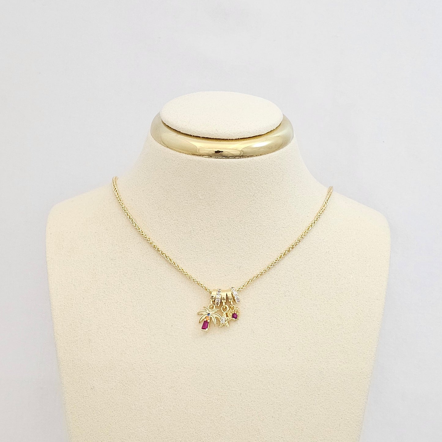 DIJE PALMERA ESTRELLA Y CORAZON DORADO RF K7546
