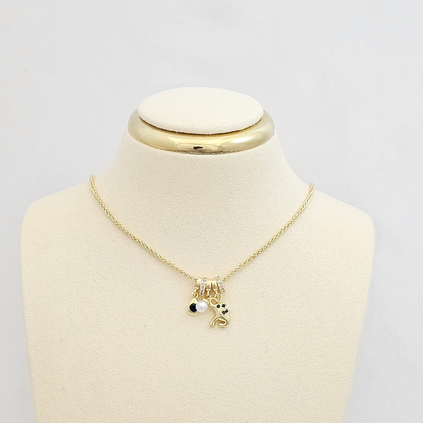 DIJE ELEFANTE PERLA Y GOTA DORADO RF K7549