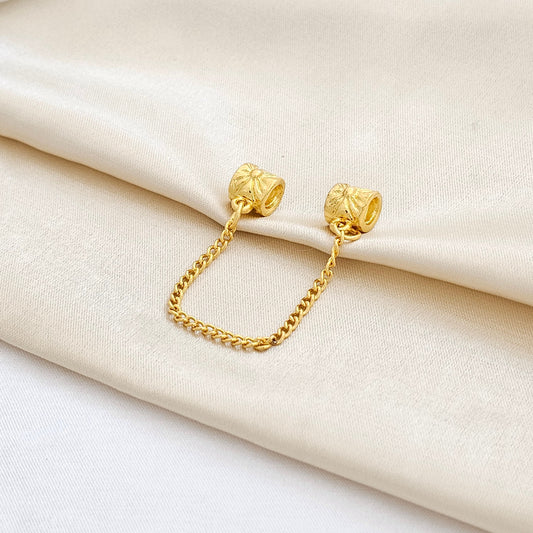 CHARM DOBLE BARRIL CON CADENA DORADO RF K7635