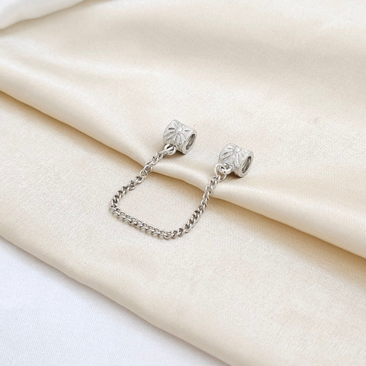 CHARM DOBLE BARRIL CON CADENA PLATEADO RF K7636