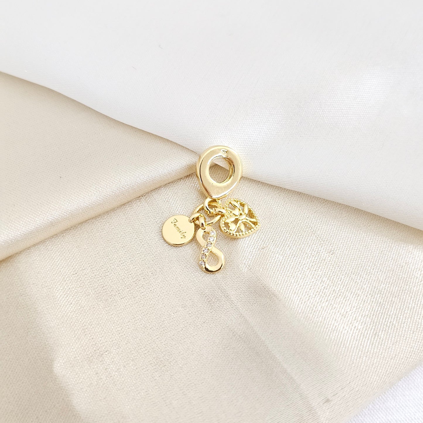 CHARM CORAZON Y INFINITO DORADO RF K7790