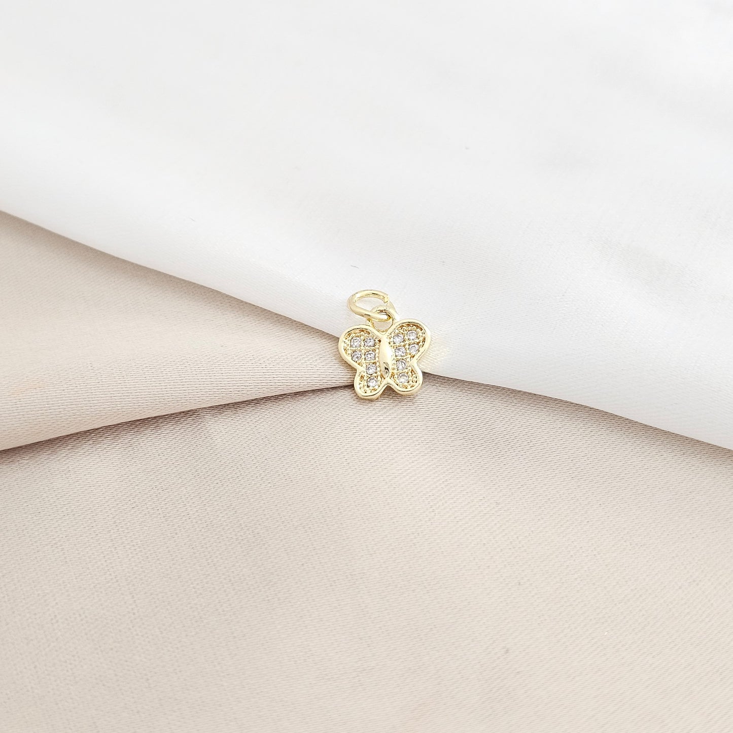 DIJE MINI MARIPOSA CON CIRCONES DORADO RF K7954