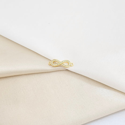 HERRAJE INFINITO CON CIRCONIAS LAM 18K B/23341