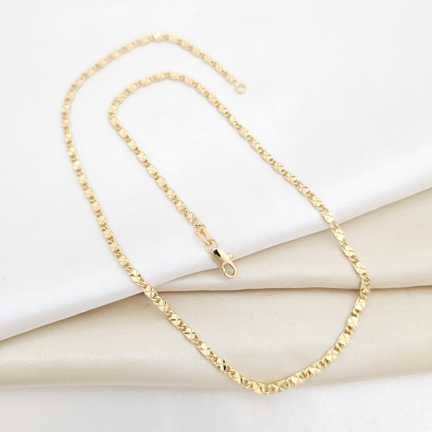 CADENA DESTELLOS 45CM 2.5CM LAM 18K-44751