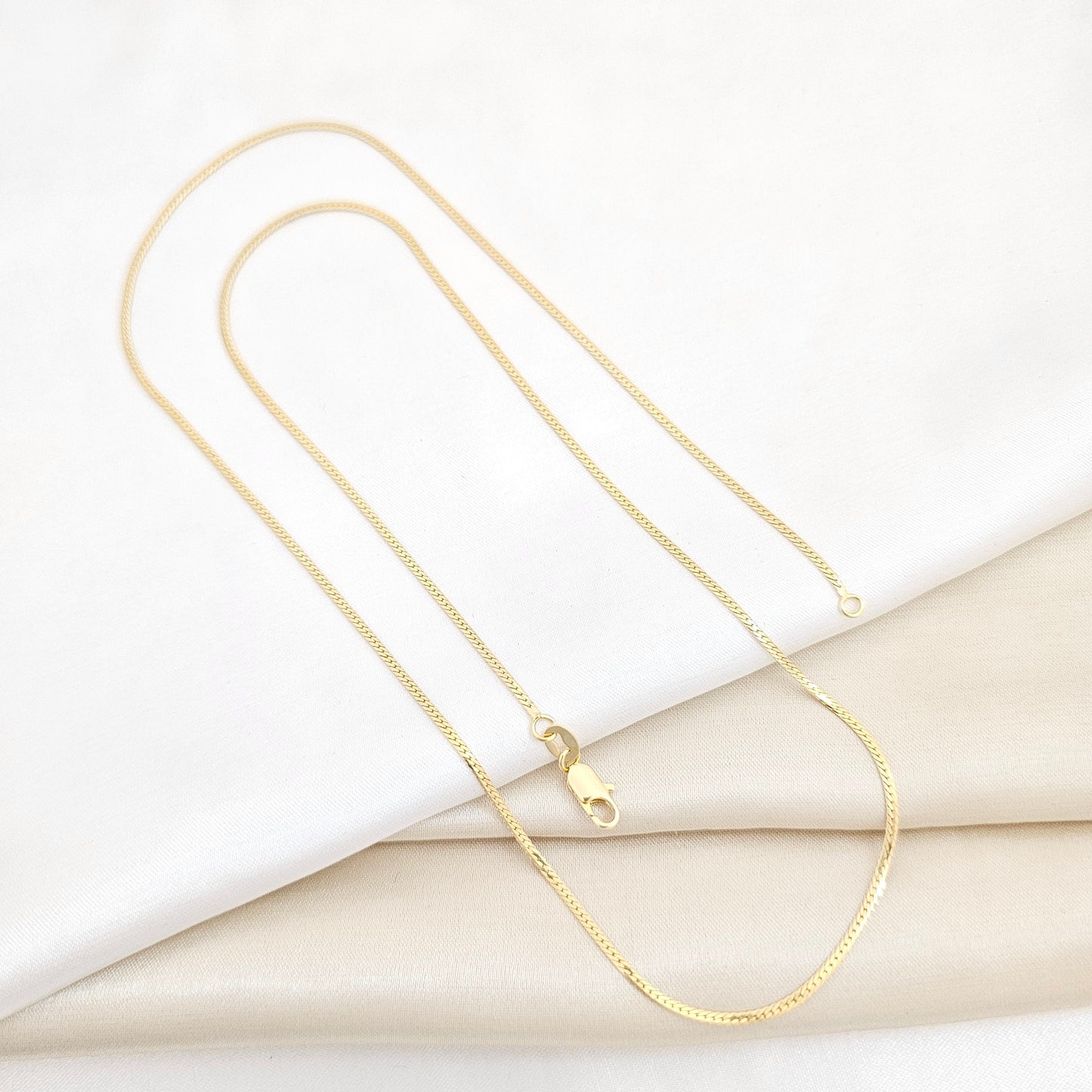 CADENA SERPIENTE PLANA DELGADA 65CM LAM 18K-44833