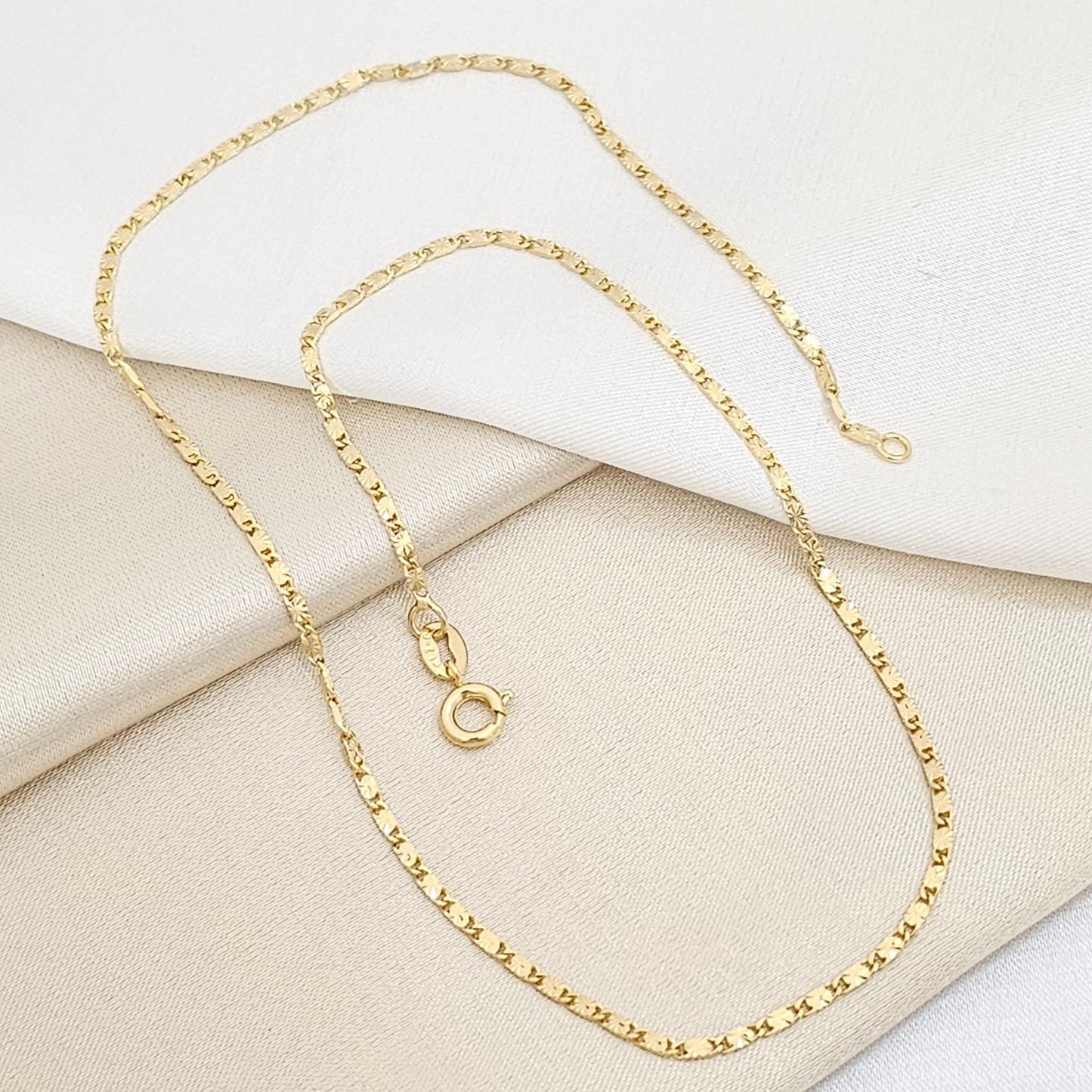 CADENA DESTELLOS 40CMS LAM 18K-44040