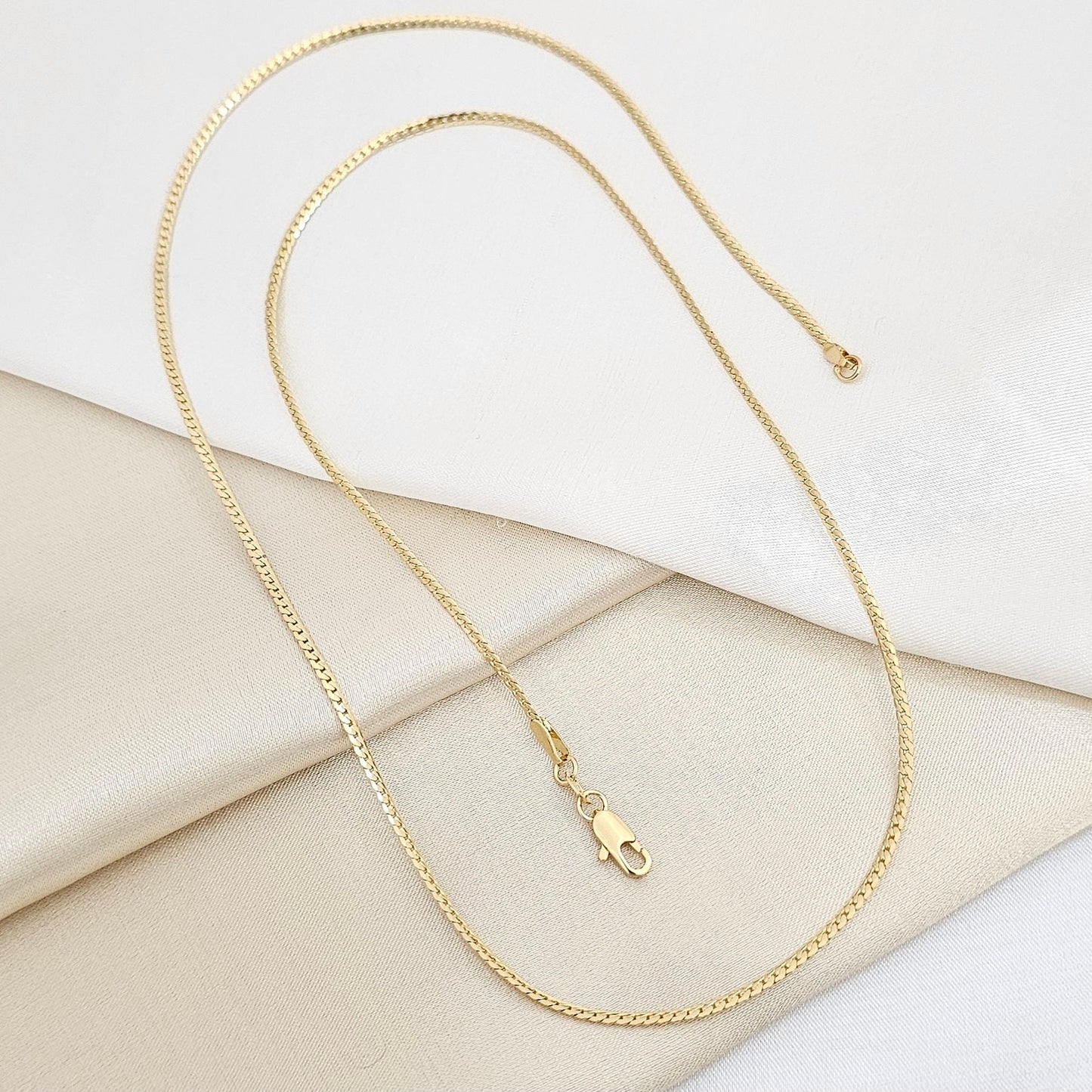 CADENA SERPIENTE PLANA FINITA 65CMS LAM18K B/40058
