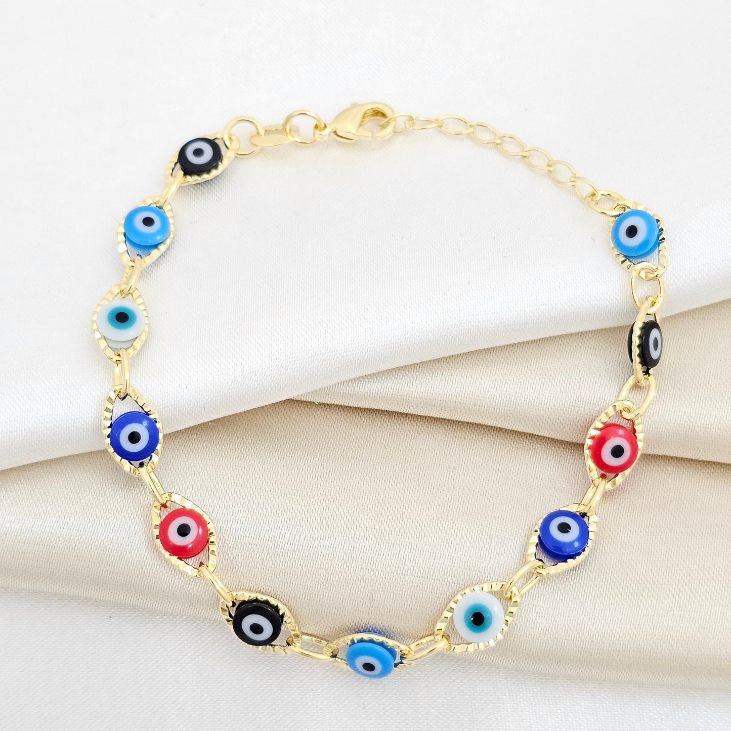 PULSERA OJO TURCO MULTICOLOR 16CMS + EXT LAM18K - 54061