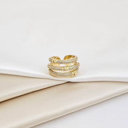 Anillo Cuatro Lineas Cruzadas Con Circones Dorado Rf K6999