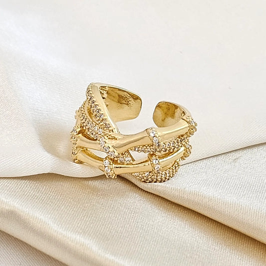 Anillo Cuatro Lineas Enlazadas Con Circones Dorado Rf K4332