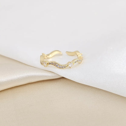Anillo Curvo Con Mini Circones Dorado Rf K7940