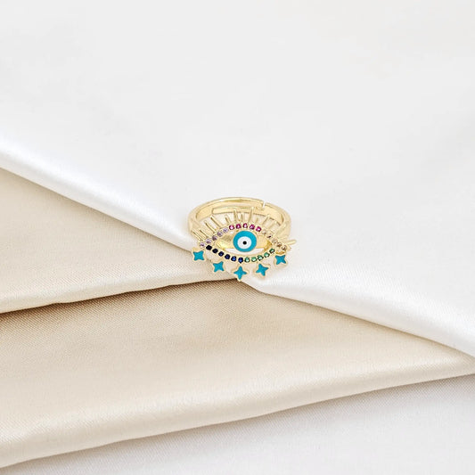 Anillo Dorado Ojo Y Estrellas Azul Con Circones Rf K5648