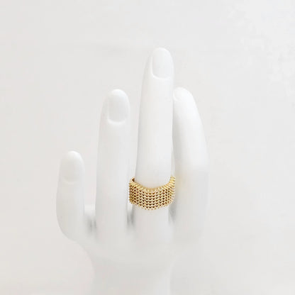 Anillo Grueso Ondulado Con Circones Dorado Rf K7583