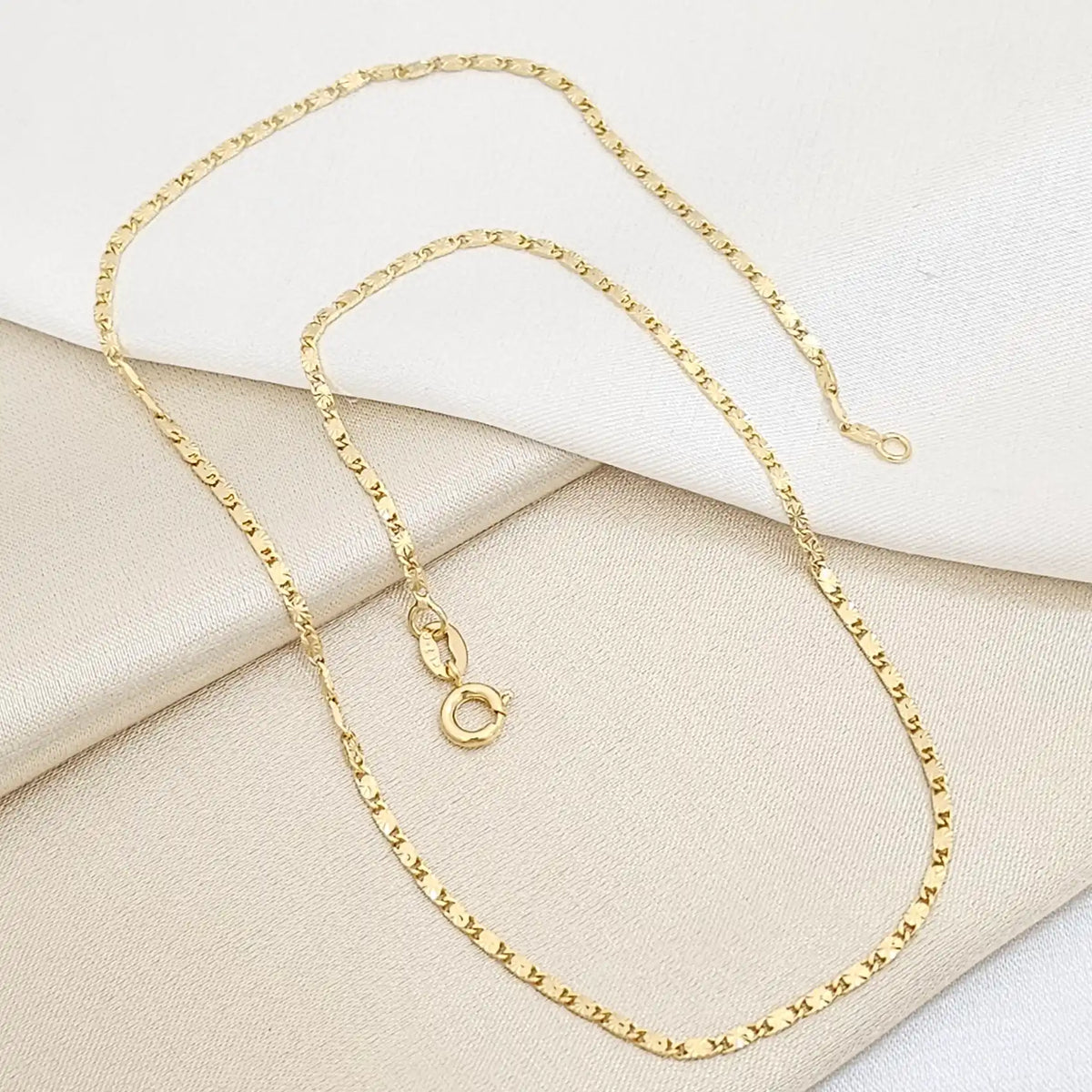 Cadena Destellos 40Cms Lam 18K-44040