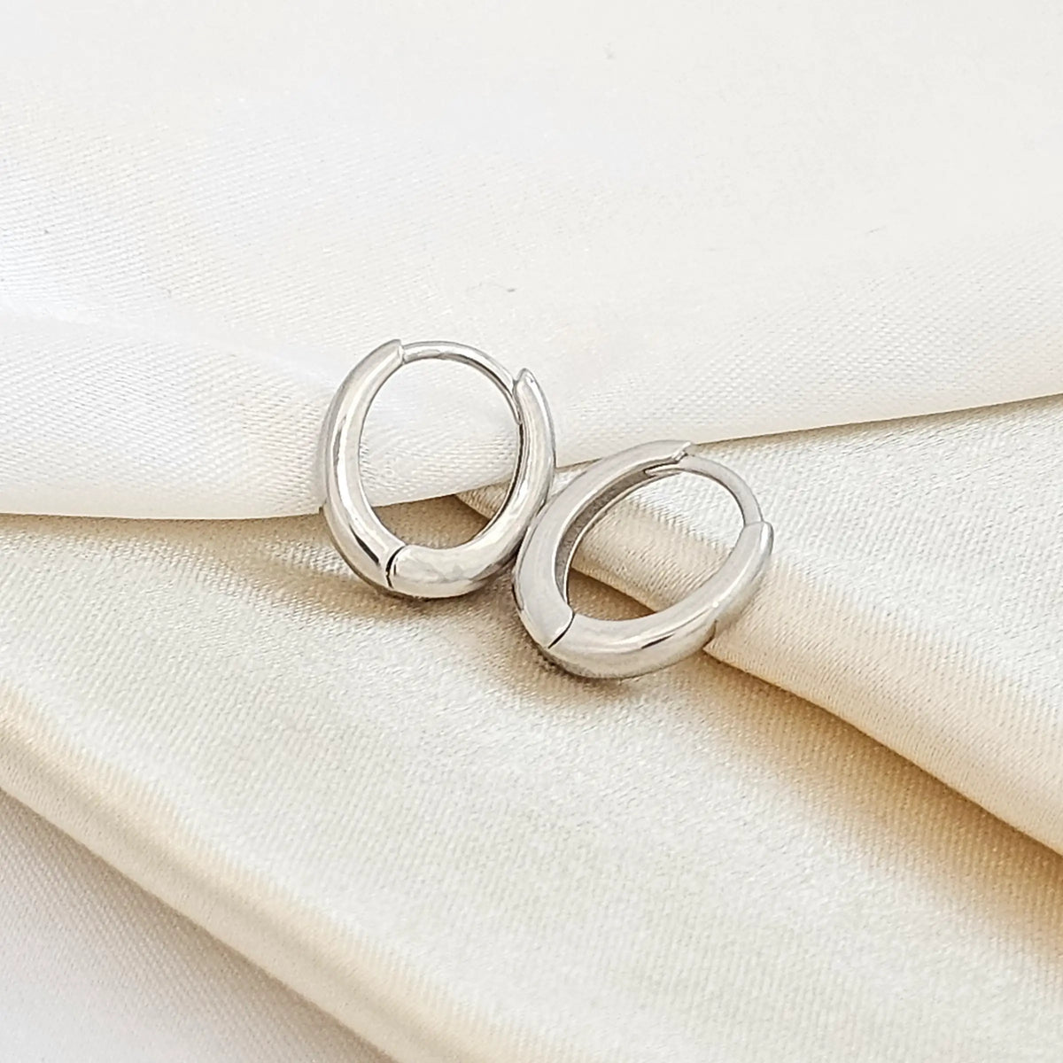 Candonga Ovalada Lisa 12Mm Plateado Rf K4368